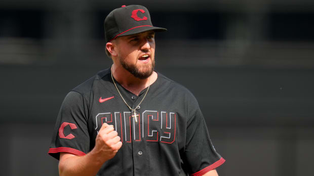 Cincinnati Reds starting pitcher Graham Ashcraft (51) reacts after striking out the last in the second inning during a baseball game between the San Diego Padres and the Cincinnati Reds, Friday, June 30, 2023, at Great American Ball Park in Cincinnati.  